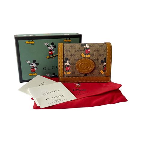 gucci x disney card case|Gucci Disney collection.